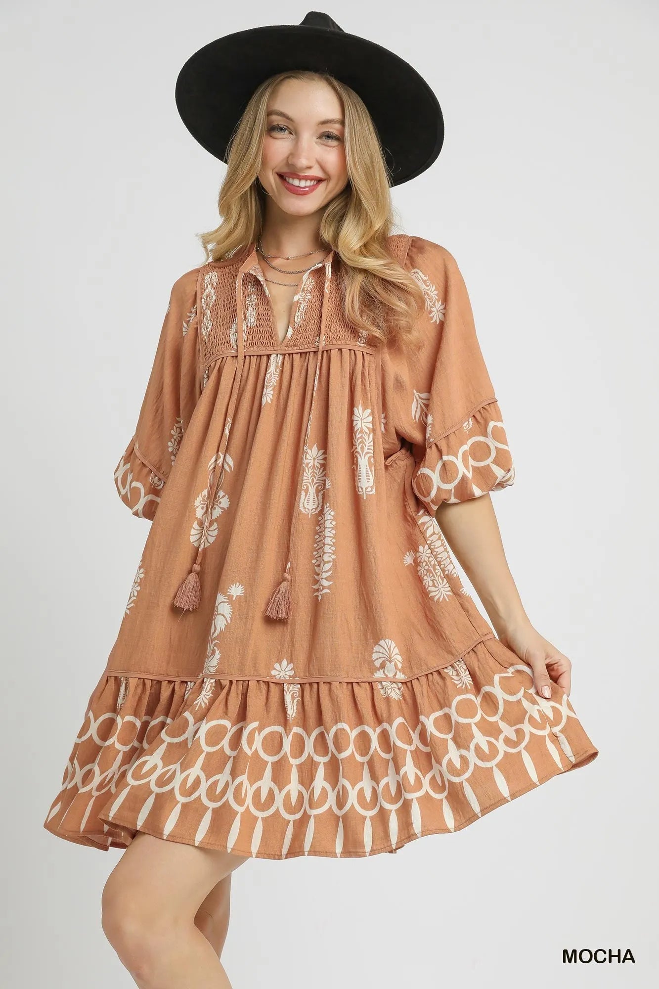 Boarder Print Tassel Tie Neck Mini Dress in Mocha - product view 1