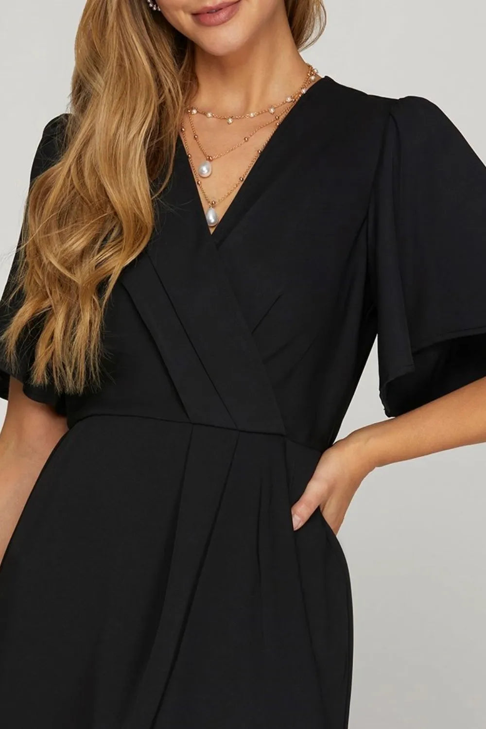 Ruffled Surplice Short Flutter Sleeve Mini Dress in Black - product view 3