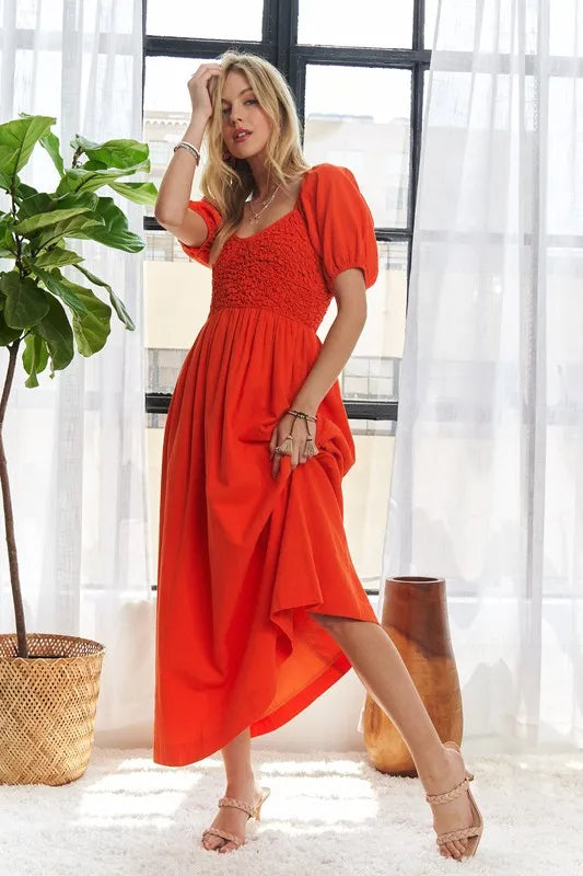 Popcorn Smocked Puff Sleeve Dress in Orange-Red - product view 1