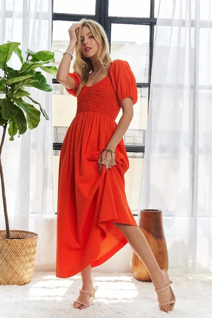 Popcorn Smocked Puff Sleeve Dress in Orange-Red - product view 1