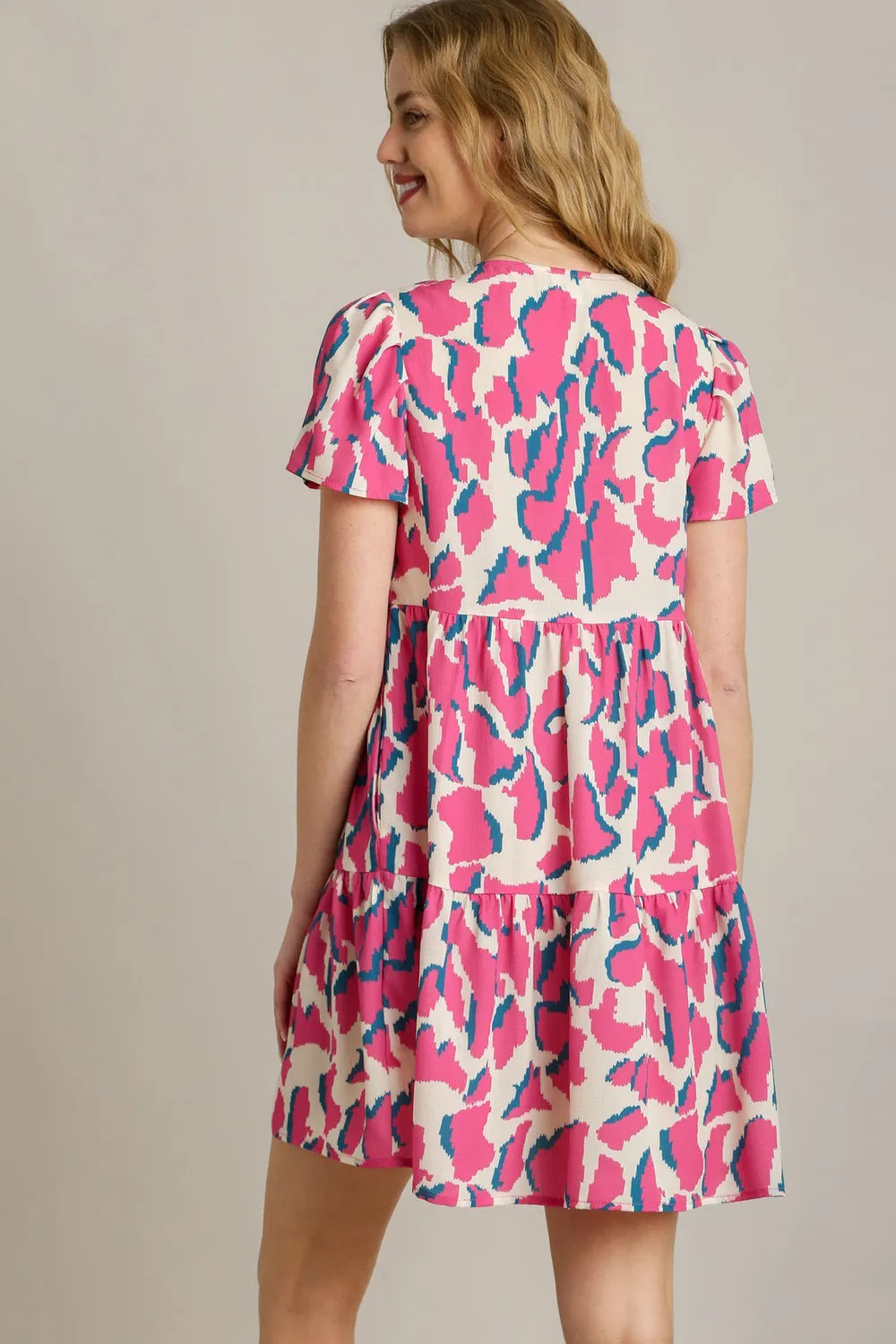 Full Size Abstract Print Pleat Detail Short Sleeve V-Neck Tiered Dress Plus Size in Creammix - product view 2